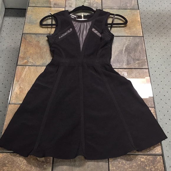 bebe Dresses & Skirts - BEBE BLACK BANDAGE ILLUSION NECKLINE DRESS